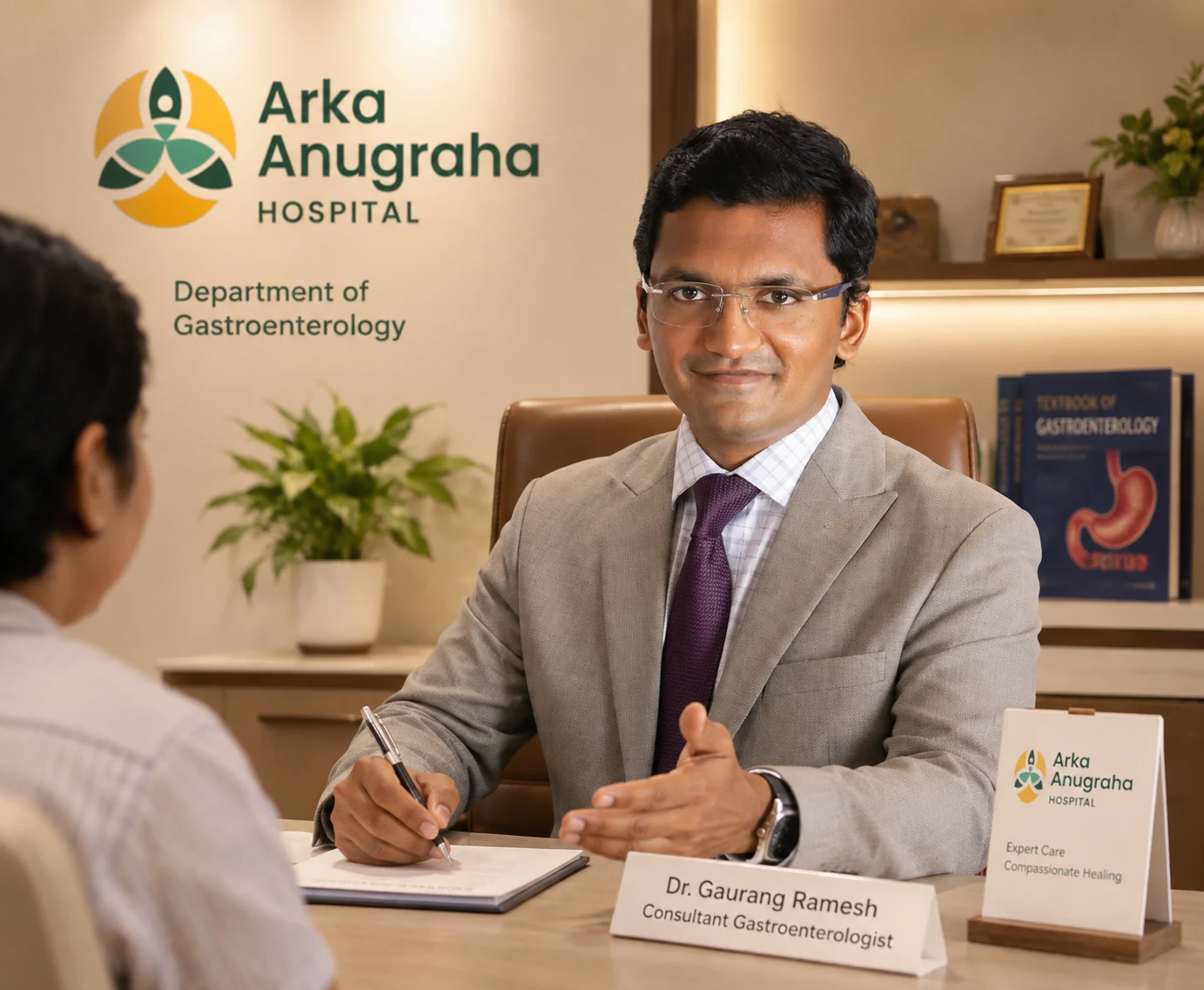 Gastroenterologist in JP Nagar Bangalore consulting with a patient at Arka Anugraha Hospital